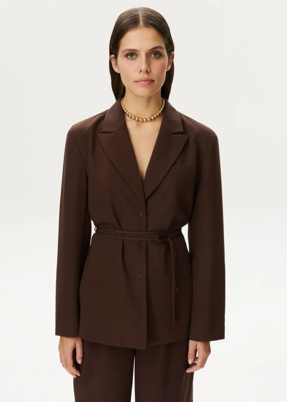 Blouse met blazer look