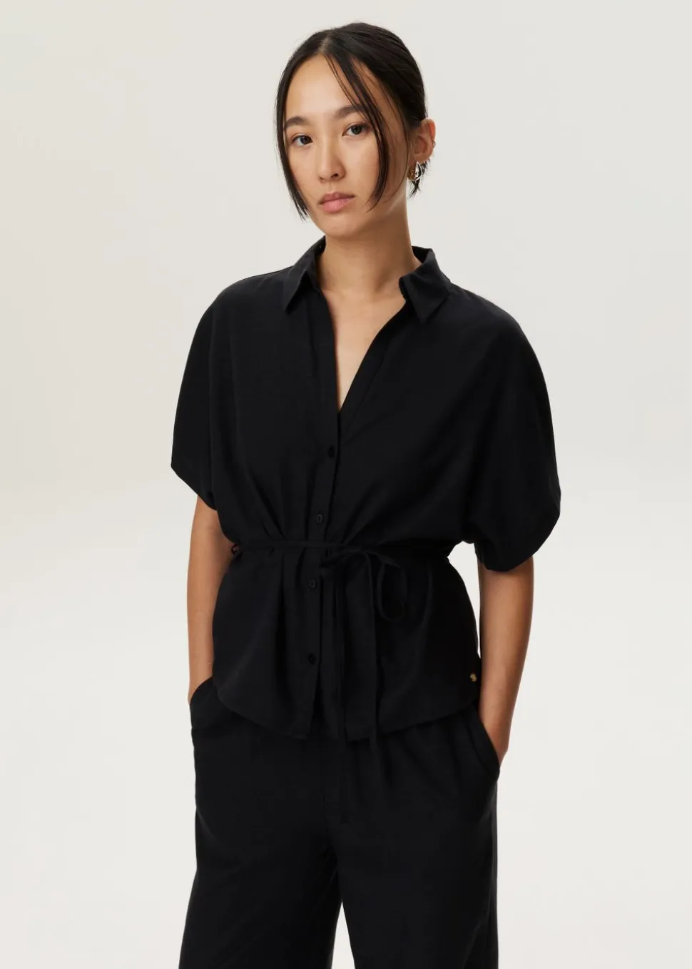 Blouse met strikceintuur