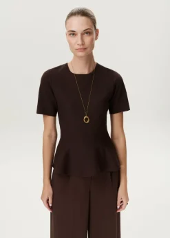 Peplum trui met ribstructuur