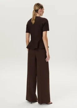 Peplum trui met ribstructuur