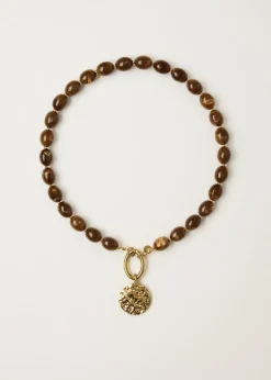 Statement kralenketting met coin